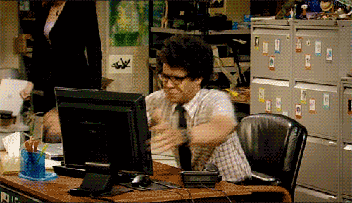 GIF contains a man throwing his computer.