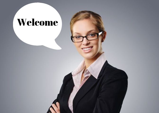 welcome-professional-business-woman Image contains a woman saying "Welcome".