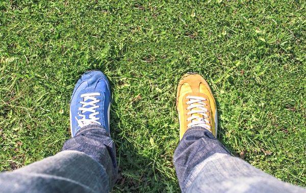 Image contains two different shoes on one person.